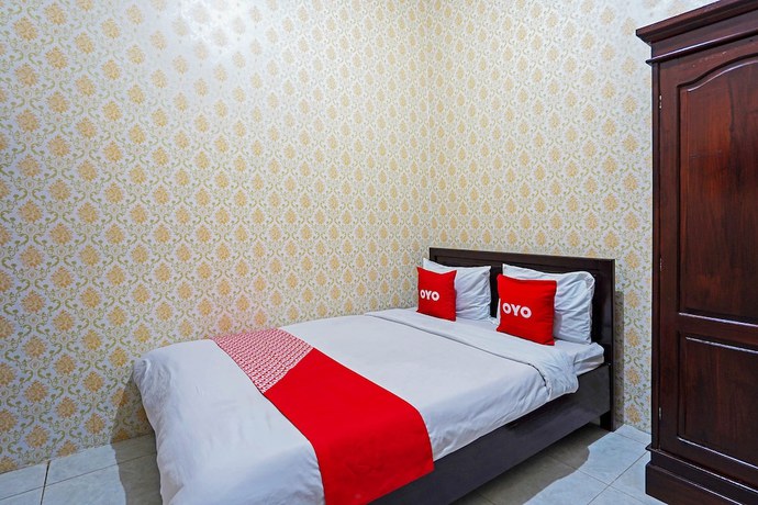 Imagen de la habitación del Hotel OYO 90829 Sahara Homestay Syariah. Foto 4