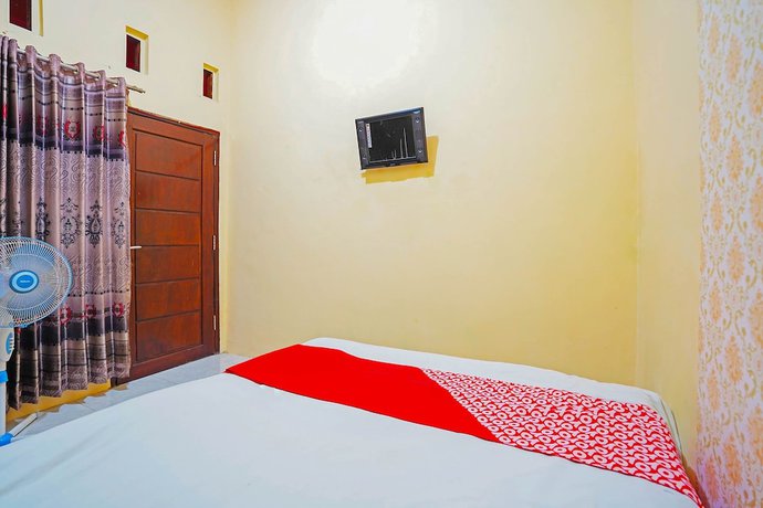 Imagen de la habitación del Hotel OYO 90829 Sahara Homestay Syariah. Foto 5