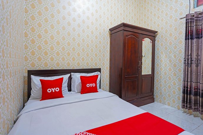 Imagen de la habitación del Hotel OYO 90829 Sahara Homestay Syariah. Foto 7