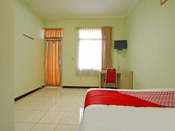 Imagen de la habitación del Hotel OYO 90836 Bartu Guesthouse. Foto 5