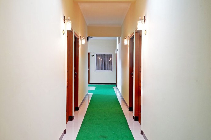 Imagen de los interiores del Hotel OYO 90836 Bartu Guesthouse. Foto 16