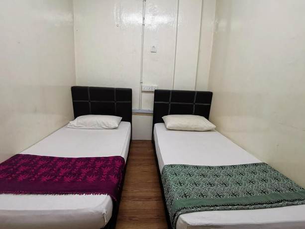 Imagen de la habitación del Hotel OYO 90838 Ros Heritage Motel. Foto 4