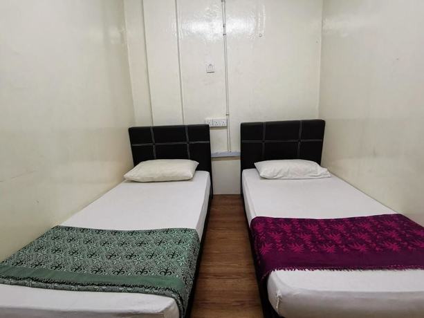 Imagen de la habitación del Hotel OYO 90838 Ros Heritage Motel. Foto 12