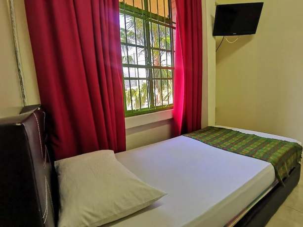 Imagen de la habitación del Hotel OYO 90838 Ros Heritage Motel. Foto 16