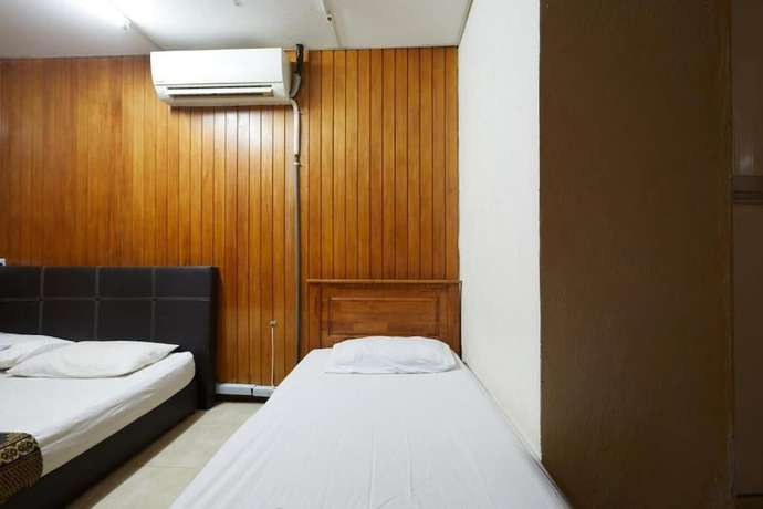 Imagen de la habitación del Hotel OYO 90838 Ros Heritage Motel. Foto 17