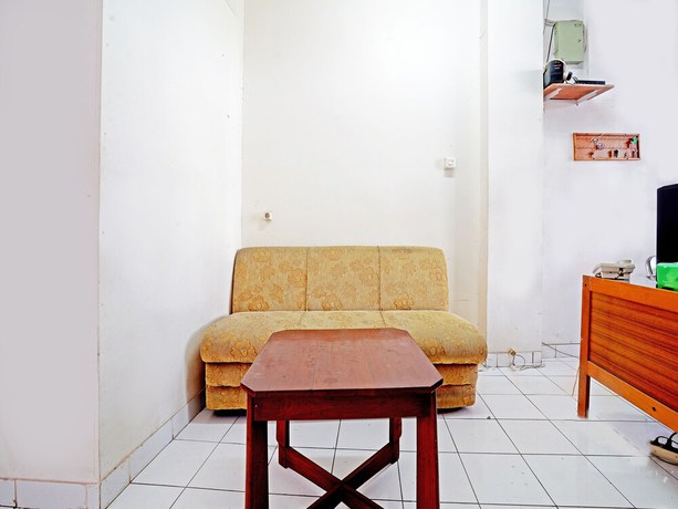 Imagen de los interiores del Hotel OYO 90840 Teratai Residence. Foto 13
