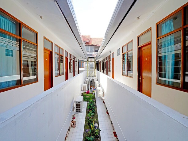 Imagen de los interiores del Hotel OYO 90840 Teratai Residence. Foto 17