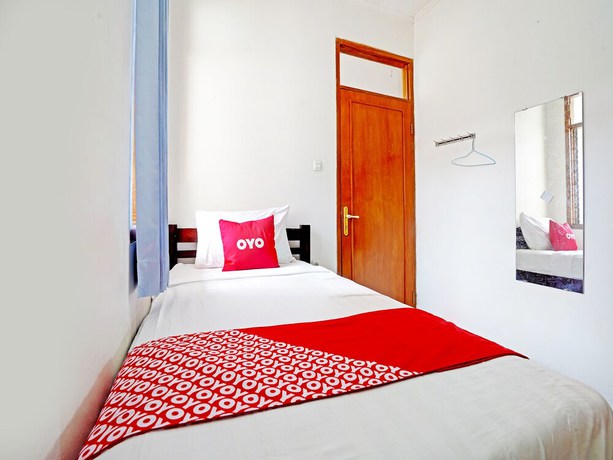 Imagen de la habitación del Hotel OYO 90840 Teratai Residence. Foto 11