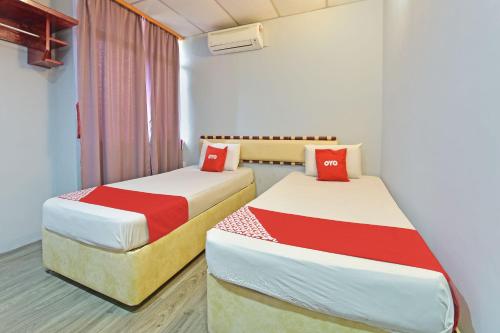 Imagen de la habitación del Hotel OYO 90846 Akasia, Sungai Petani. Foto 15