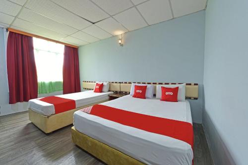 Imagen de la habitación del Hotel OYO 90846 Akasia, Sungai Petani. Foto 20