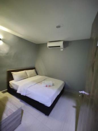 Imagen general del Hotel OYO 90848 Link Suite. Foto 16