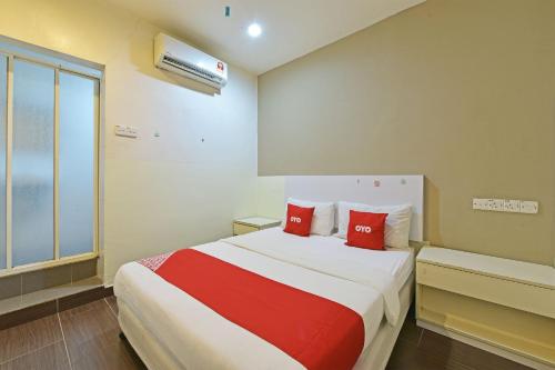 Imagen de la habitación del Hotel OYO 90853 New Soho. Foto 14