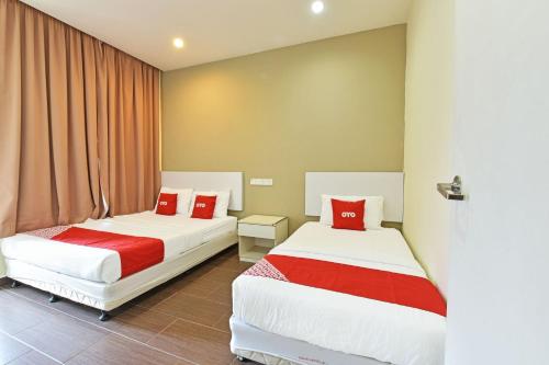 Imagen de la habitación del Hotel OYO 90853 New Soho. Foto 16