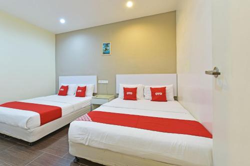 Imagen de la habitación del Hotel OYO 90853 New Soho. Foto 19