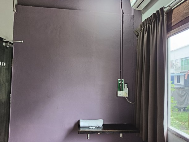 Imagen de la habitación del Hotel OYO 90863 Hi Inn 2. Foto 2