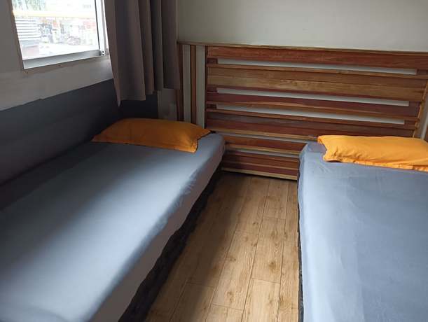 Imagen de la habitación del Hotel OYO 90863 Hi Inn 2. Foto 9