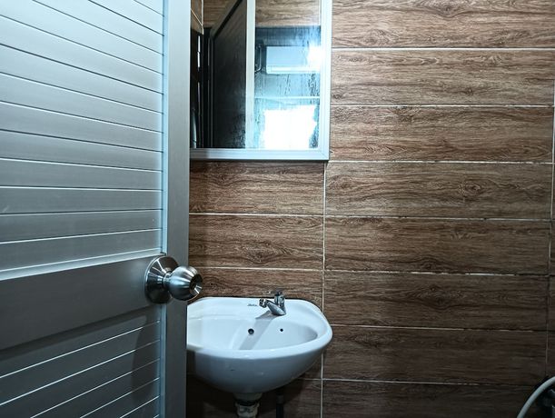 Imagen de la habitación del Hotel OYO 90863 Hi Inn 2. Foto 12