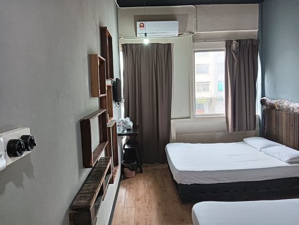 Imagen de la habitación del Hotel OYO 90863 Hi Inn 2. Foto 13