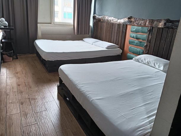 Imagen de la habitación del Hotel OYO 90863 Hi Inn 2. Foto 16