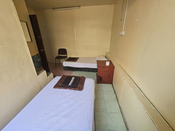 Imagen de la habitación del Hotel OYO 90867 Bintang Inns. Foto 7