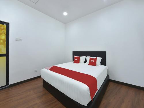 Imagen de la habitación del Hotel OYO 90869 Madeena Inn. Foto 16