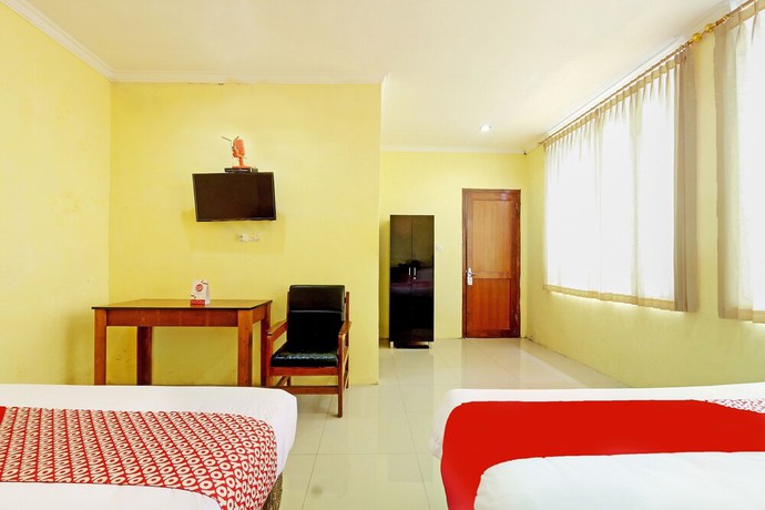 Imagen de la habitación del Hotel OYO 90878 Pakem Sari and Convetion. Foto 3