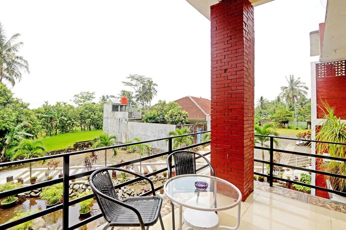 Imagen de los interiores del Hotel OYO 90878 Pakem Sari and Convetion. Foto 14
