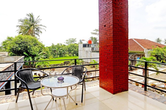 Imagen de los interiores del Hotel OYO 90878 Pakem Sari and Convetion. Foto 15
