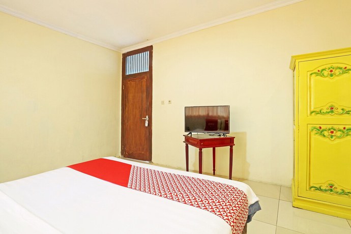 Imagen de la habitación del Hotel OYO 90878 Pakem Sari and Convetion. Foto 11
