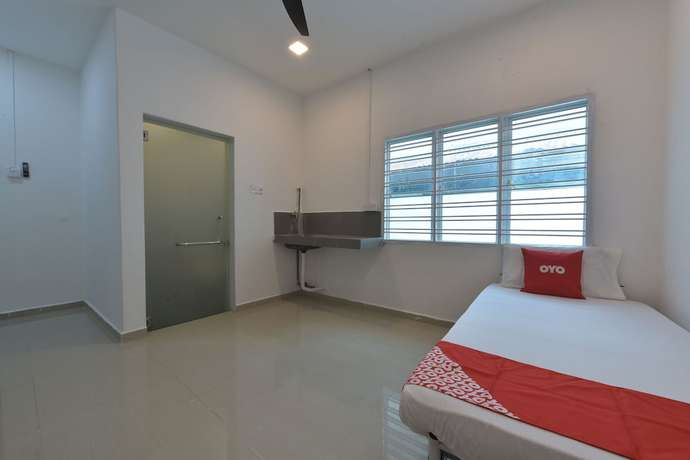 Imagen de la habitación del Hotel OYO 90889 Narasindo Cottage. Foto 8