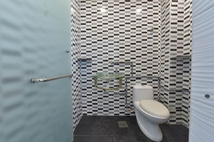 Imagen de la habitación del Hotel OYO 90889 Narasindo Cottage. Foto 18