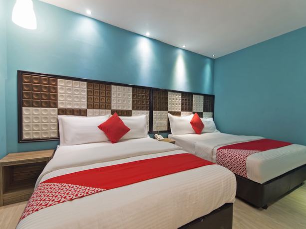 Imagen de la habitación del Hotel OYO 90894 Smc I-city. Foto 3