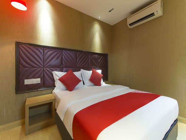 Imagen de la habitación del Hotel OYO 90894 Smc I-city. Foto 6