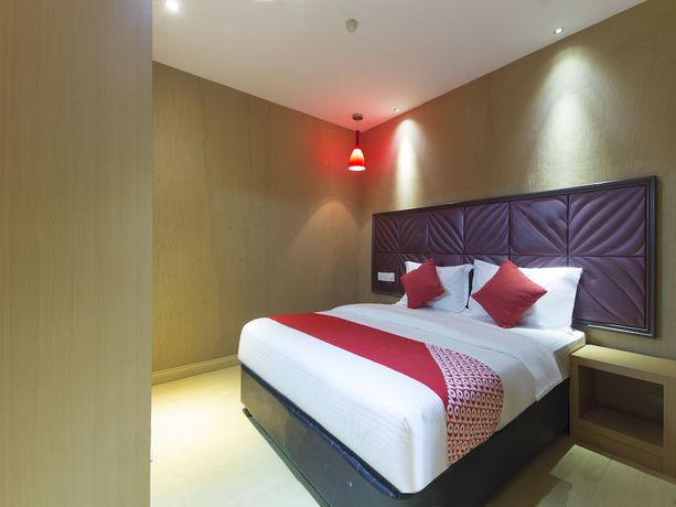 Imagen de la habitación del Hotel OYO 90894 Smc I-city. Foto 8