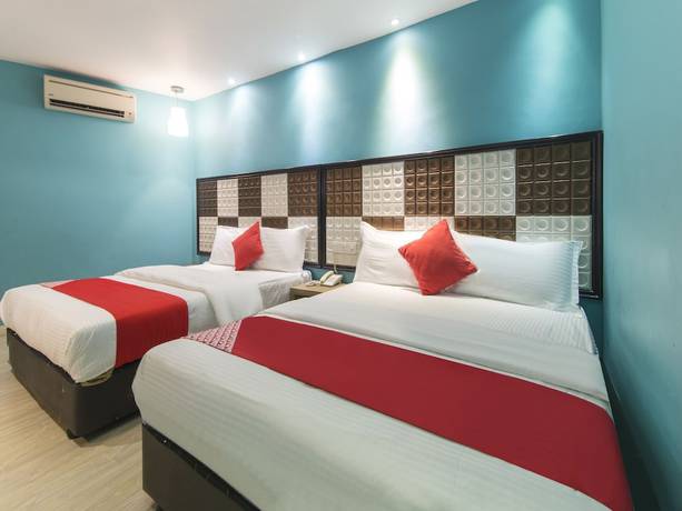 Imagen de la habitación del Hotel OYO 90894 Smc I-city. Foto 9