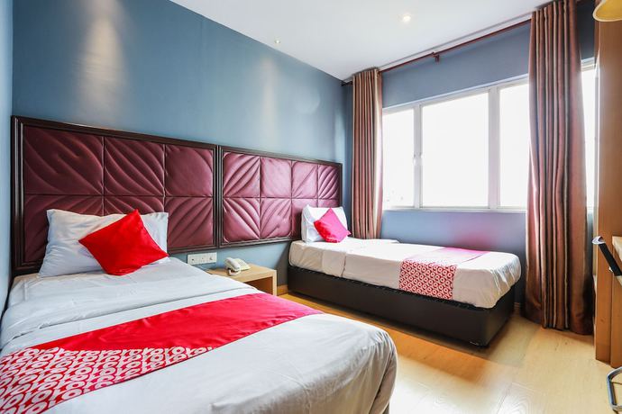 Imagen de la habitación del Hotel OYO 90894 Smc I-city. Foto 11