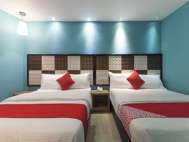 Imagen de la habitación del Hotel OYO 90894 Smc I-city. Foto 12