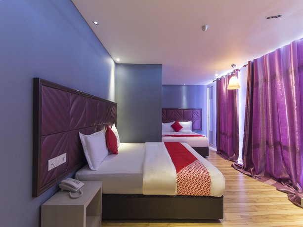 Imagen de la habitación del Hotel OYO 90894 Smc I-city. Foto 16