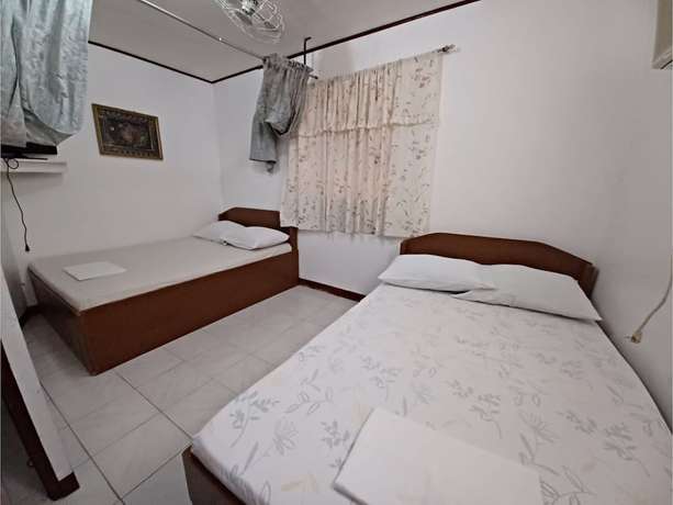 Imagen de la habitación del Hotel OYO 909 Jc Affordable Transient. Foto 2