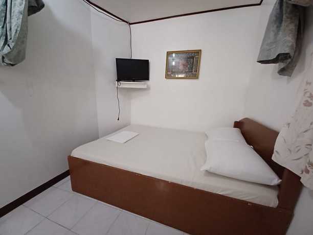 Imagen de la habitación del Hotel OYO 909 Jc Affordable Transient. Foto 13
