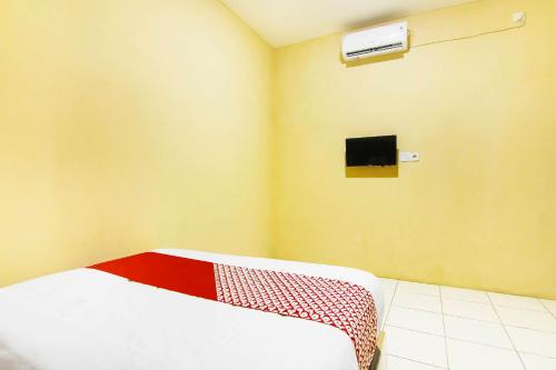 Imagen general del Hotel OYO 90900 Pagi Sore Residence. Foto 11