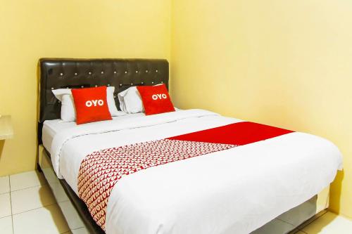 Imagen de la habitación del Hotel OYO 90900 Pagi Sore Residence. Foto 19