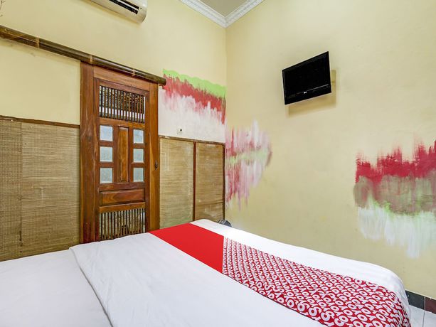 Imagen de la habitación del Hotel OYO 90903 Chez Laelik Homestay. Foto 12