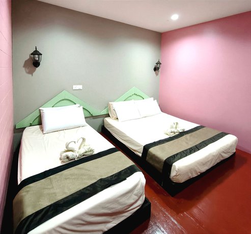Imagen de la habitación del Hotel OYO 90906 Rumah Rehat Awana. Foto 2