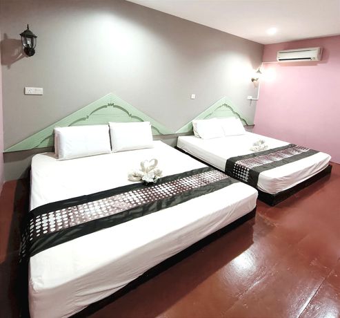 Imagen de la habitación del Hotel OYO 90906 Rumah Rehat Awana. Foto 6