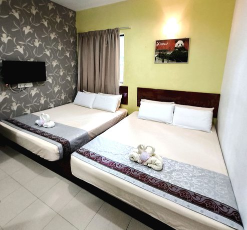 Imagen de la habitación del Hotel OYO 90906 Rumah Rehat Awana. Foto 8