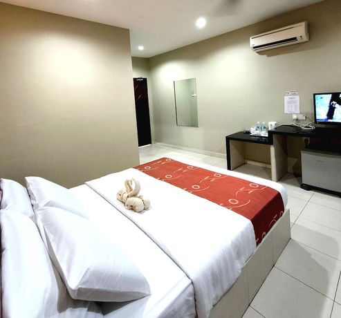 Imagen de la habitación del Hotel OYO 90906 Rumah Rehat Awana. Foto 10