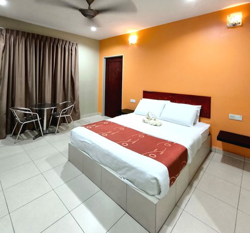 Imagen de la habitación del Hotel OYO 90906 Rumah Rehat Awana. Foto 11