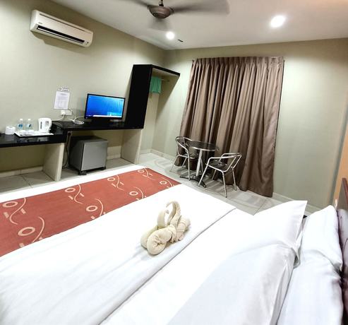 Imagen de la habitación del Hotel OYO 90906 Rumah Rehat Awana. Foto 12