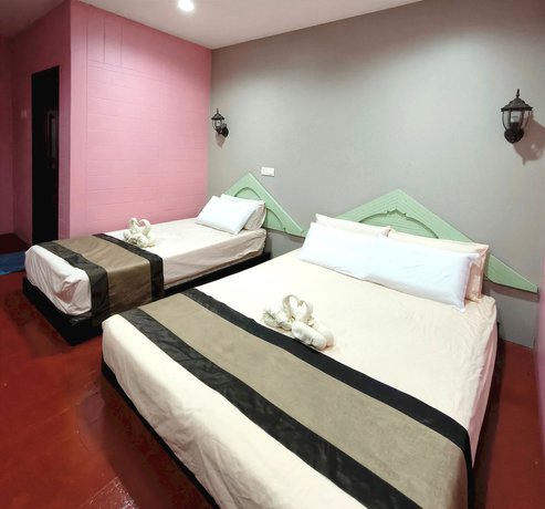 Imagen de la habitación del Hotel OYO 90906 Rumah Rehat Awana. Foto 13